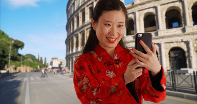 Close up of millennial Chinese woman taking selfie in Rome Italy