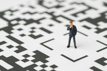 Leadership, solution for business idea concept, miniature figurine businessman standing at the...