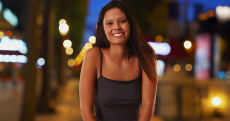 Fototapeta premium Tourist woman on the Champs-Elysees in Paris France smiling at camera