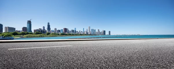 Fotobehang asphalt highway with modern city in chicago © zhu difeng