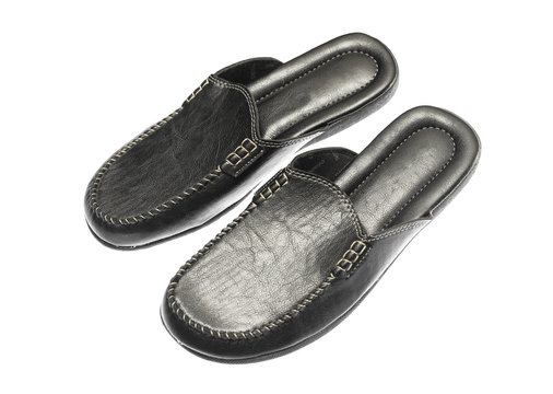 men's leather black slippers on a white background