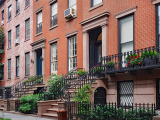 front steps of New York brownstone apartment buildings