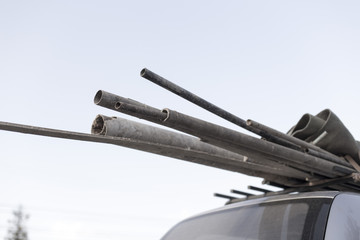 old metal trumpet on the trunk of the car