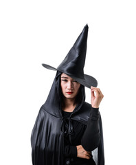 Fototapeta premium Portrait of woman in black Scary witch halloween costume standing with hat isolated on white background