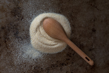 Onion Powder Spilled from a Teaspoon