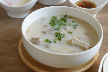Congee or conjee s a type of rice porridge popular in many Asian countries. When eaten as plain rice , it is often served with side dishes. When additional ingredients such as meat, fish, are added