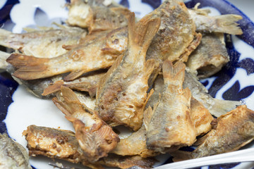 Fried fish in the kitchen