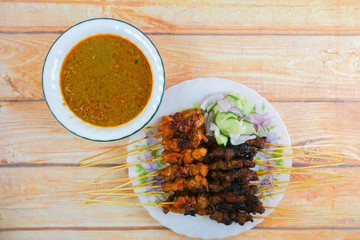 The Malaysian delicacy commonly known as Satay (bamboo stick skewered barbequed meat).