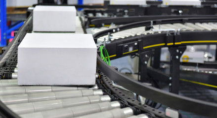 cardboard boxes on conveyor belt.parcels transportation system concept
