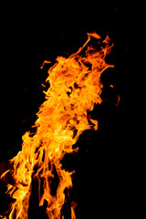 Flame of fire with sparks on a black background