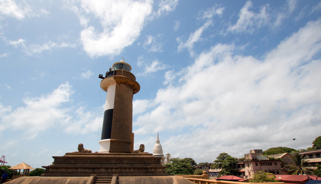 Old Lighthouse under cumulus clouds at the Galle Face in Colombo Sri Lanka Asia