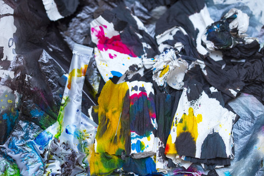 Abstract Background Of Colored Paint From Printer On Paper. A Topic For Waste And Garbage