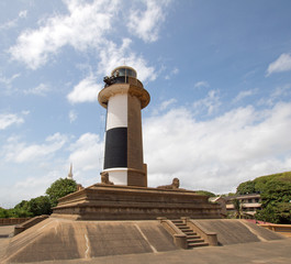 Fototapeta na wymiar Old Lighthouse tower at the Galle Face in Colombo Sri Lanka Asia