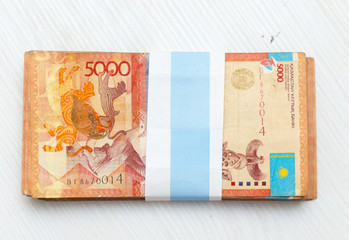 Fototapeta na wymiar Kazakh banknotes on a white background