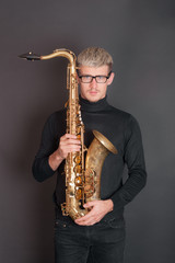 Fototapeta na wymiar musician with saxophone