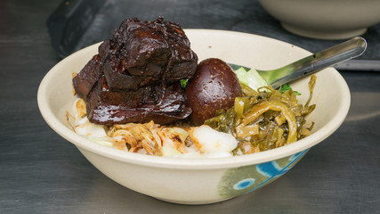 The close up of Taiwan Traditional Pork Knuckle Rice at street food shop in Taipei, Taiwan.