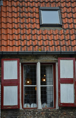 Old windows of houses in Brugge, Belgium