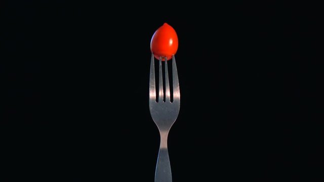 Vegetables salad food on fork on black background. Healthy diet food with vitamin.shoot by rotation 360 degree around view in loop able.