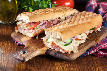 Toasted sandwiches with ham, cheese and other