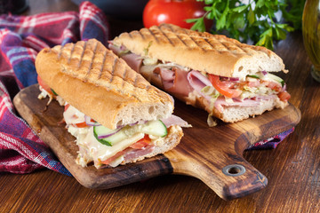 Toasted sandwiches with ham, cheese and other