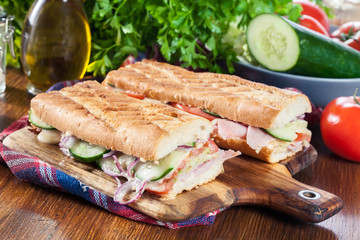 Toasted sandwiches with ham, cheese and other