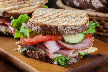 Toasted sandwiches with ham, cheese and other