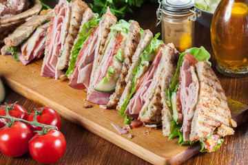 Toasted sandwiches with ham, cheese and other