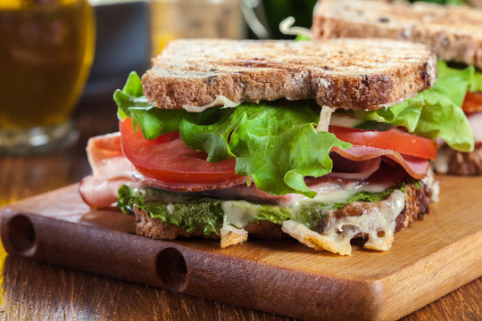 Toasted sandwiches with ham, cheese and other
