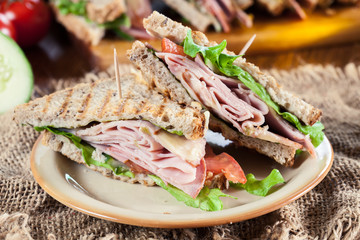 Toasted sandwiches with ham, cheese and other
