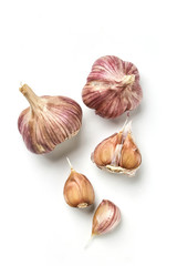 Garlic, garlic cloves on a white background, broken garlic isolated