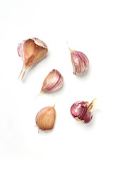 Garlic, garlic cloves on a white background, broken garlic isolated