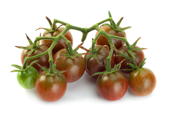 Brown cherry ripe tomatoes isolated on white background
