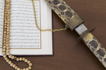 Koran and rosary beads for Islamic concept. Holy book quran for Muslims holiday, Ramadan,blessed Friday message and three months.
