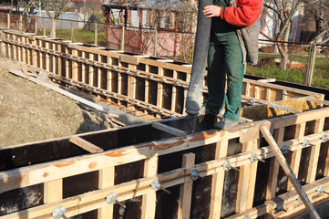 Contactor Building T-Shaped Concrete House Foundation with Slabs and iron Bars.