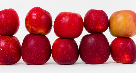 Red apples on the white background 