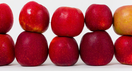 Red apples on the white background 
