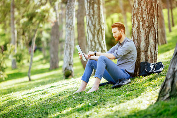 Student studying in park