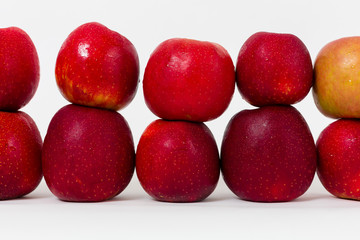 Red apples on the white background 