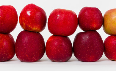Red apples on the white background 