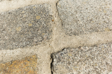 Rough Cobblestones Stuck In Cement