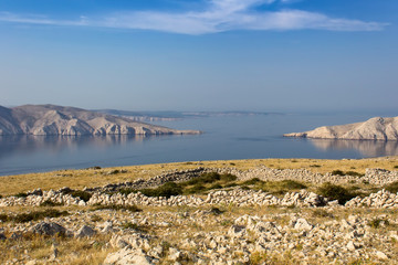Fototapeta na wymiar Nice calm sea with cliffs and stone, island Krk, Croatia