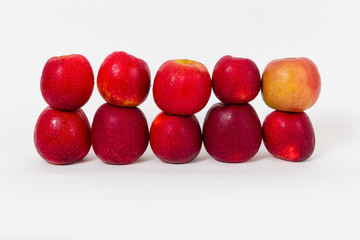 Red apples on the white background 