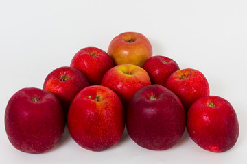 Red apples on the white background 