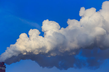 Smoke from the pipes of the factory