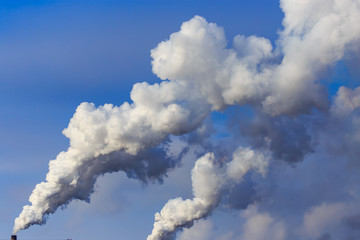 Smoke from the pipes of the factory