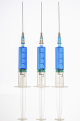 Syringes with blue liquid