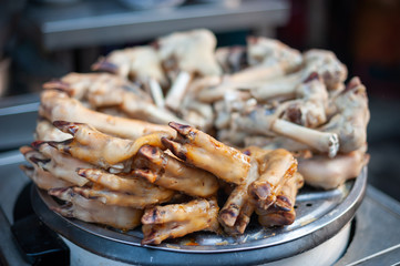 Cooked sheep's hooves in a street market