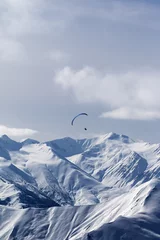 Fototapeten Sky gliding in winter mountains © BSANI