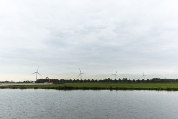 Wind Turbines Overlooking Construction Site