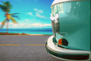 The vintage van rides along the coastal highway along the beach with palm trees. The concept of vacation, travel. - obrazy, fototapety, plakaty